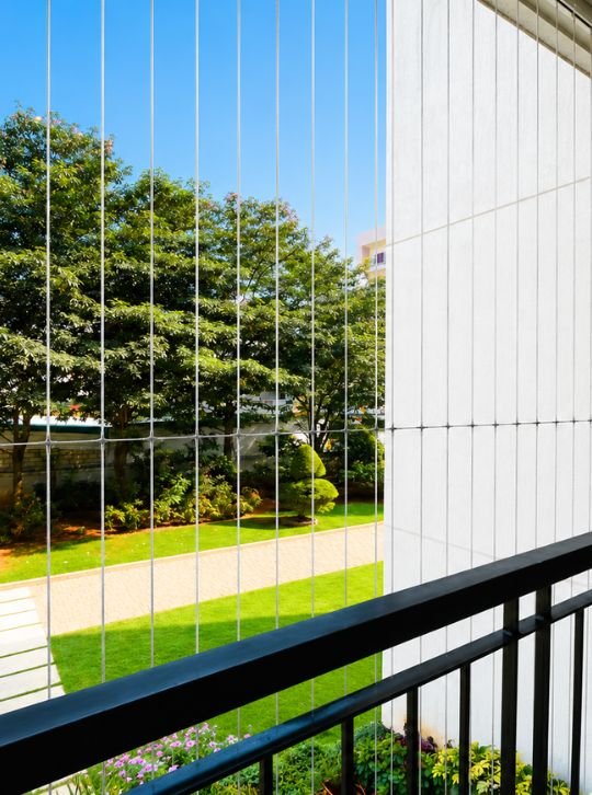 KNR Safety Solutions invisible grill installation for balcony in Andhra Pradesh